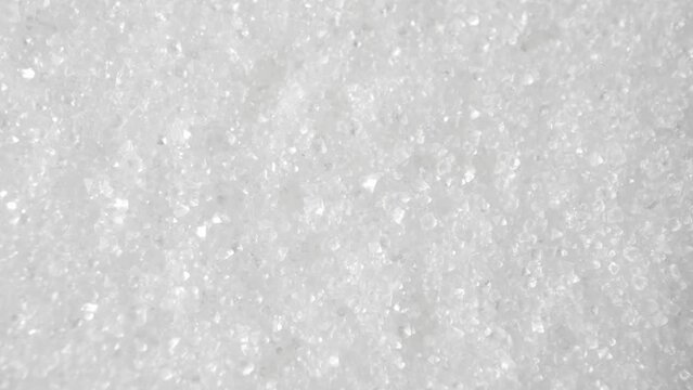 Iodized salt is a crucial dietary element, vital for thyroid function and preventing iodine deficiency. This macro video showcases its crystalline structure and the integration of iodine.
