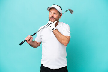 Middle age caucasian golfer player man isolated on blue background having doubts