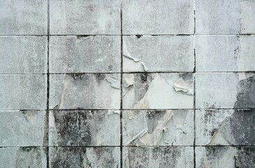 A old white concrete wall  surface broken of painted, abstract background for design with copy space.