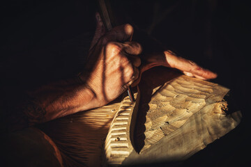 detailed view of the wood carver