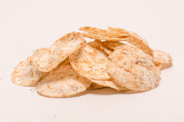 Rice chips isolated on white background.