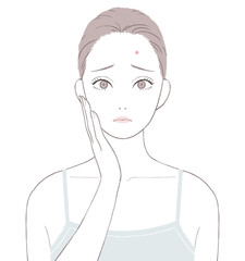 おでこのニキビに悩む女性