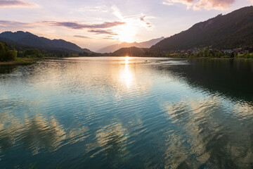 Scenic sunset on the mountain lake.