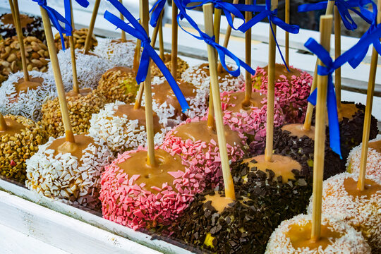 Tasty sweets on the sticks.