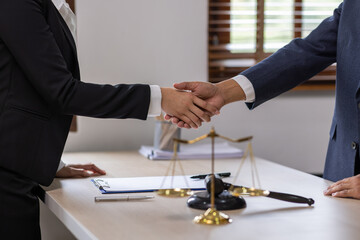 Business Asian people and lawyers, Businessman and lawyer discuss the contract document. Judge gavel deciding on marriage divorce signing papers. lawyer concept.
