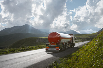 fuel tanker truck on th mountain road - 631761772