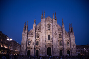 Fototapeta premium view of famous Milan Cathedral (Duomo di Milano) on piazza in Milan, Italy 