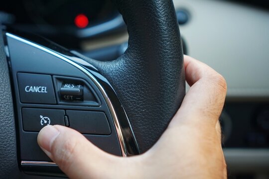 Family car cruise control button on the left side of the steering wheel	