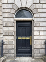 A famous black painted Georgian door in Dublin, Ireland