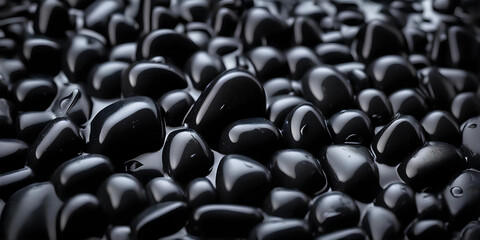 Obraz premium Banner with wet black stones, bright poster cover, filled background with black stones