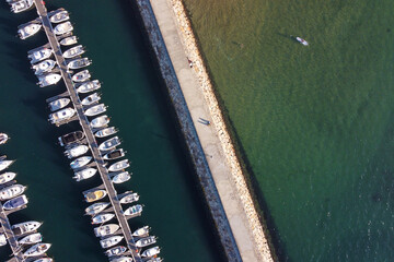 Fototapeta na wymiar Aerial view over boats in a marina. Portugal, 2023 