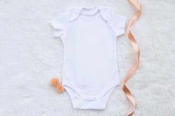 baby bodysuit mockup for your design.