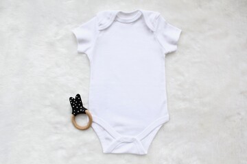 baby bodysuit mockup for your design.