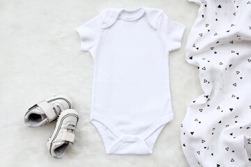 baby bodysuit mockup for your design.
