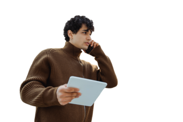 Young man talking on phone while holding tablet with transparent background