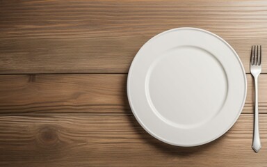 white plate seen from above on wooden table