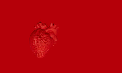 Red heart on red background. World heart day, world health day, doctor day, world hypertension day