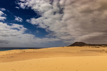 lost mountain in the middle of the dunes