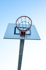 Basketball hoop in the sky in portrait format