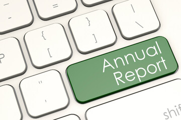 Annual report word on laptop keyboard