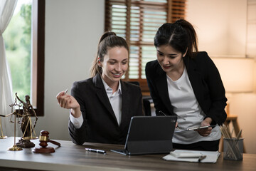 Judge gavel with Justice lawyers having team Concepts of Law and Legal services