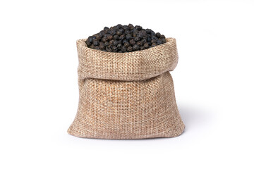 Black peppercorns (Black pepper) seeds in sack bag isolated on white background.
