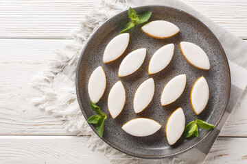 Provencal french Calisson sweets from melon, almond and orange covered with white royal icing...