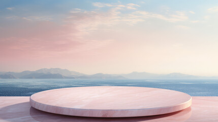 pink oval marble surface on marble table with a view of the sea