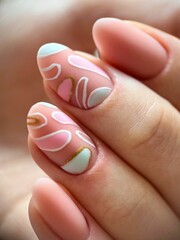 Vertical shot of a beautiful nail design on oval nails