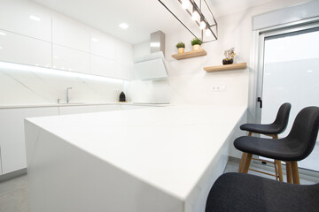 modern kitchen perfectly equipped with its appliances in a house 