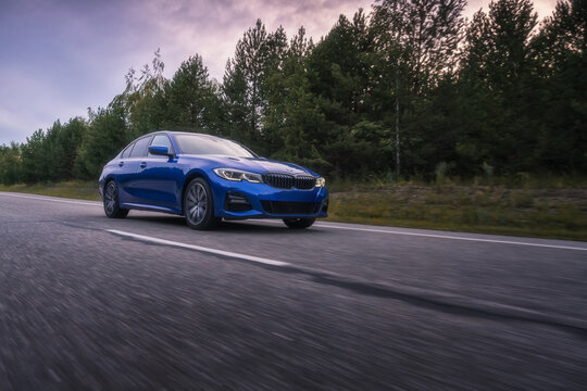 Seattle, Washington, USA, August 4, 2023 BMW 320 blue. the car is on the road . The 3rd series is a BMW model.  Sports Car Concept