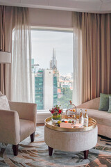 Step into a world of opulence and grandeur, where luxury and modernity intertwine seamlessly in this exquisite living room that offers an awe-inspiring city view.