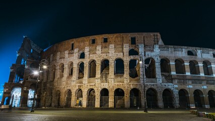 Beautiful shot of the Colosseum in Rome at night