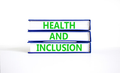 Health and inclusion symbol. Concept words Health and inclusion on beautiful book. Beautiful white table white background. Business motivational health and inclusion concept. Copy space.