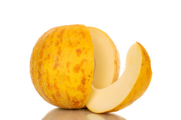 Fototapeta na wymiar One sliced yellow melon, macro, isolated on white background.