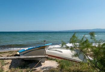 Fototapeta premium view of small boats parked on the seashore