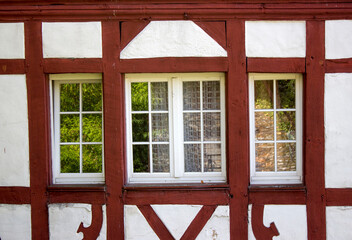 Fototapeta premium Old Building with old window in Beilstein