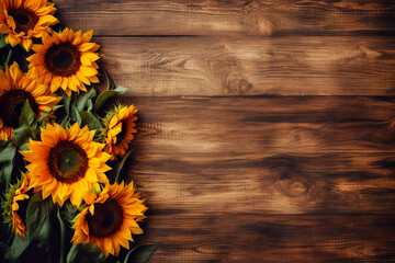 Autumn background with sunflowers on wooden board