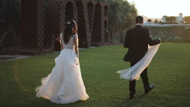 Bride and Groom Walking Side by Side