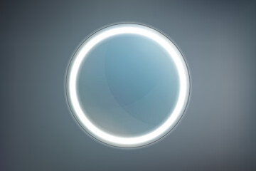Round bathroom or vanity mirror with white LED backlit on a dark background. Trendy interior design object without reflection. Modern backlight imitating a solar eclipse
