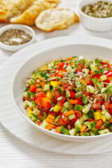 Israeli salad of finely diced veggies in bowl