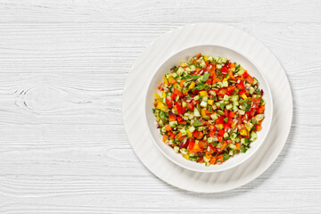 Israeli salad of finely diced veggies in bowl