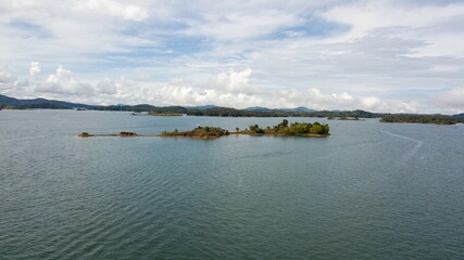 a view of an island in the middle of a body of water