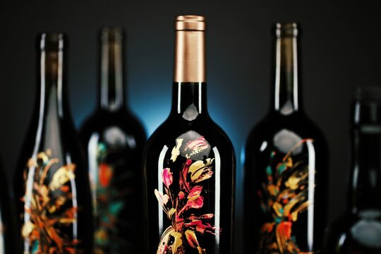 High-resolution image depicts bottles of wine displayed in full, with clear detail and clarity