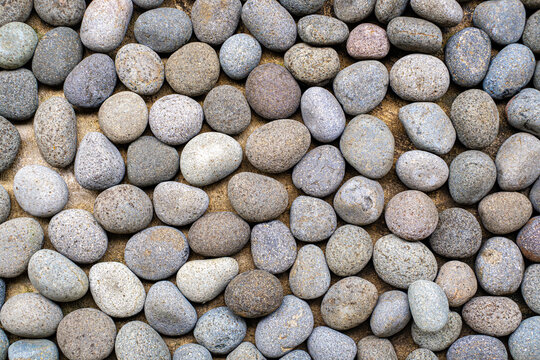 Small sea stones, gravel. Background. Textures