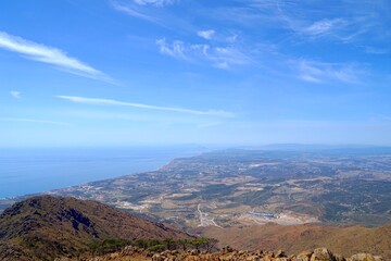 view from the Pico de Los Reales over the coastline of the Costa del Sol towards the Rock of Gibraltar, Paraje Natural Los Reales de Sierra Bermeja, Estepona, Andalusia, Malaga, Spain
