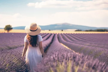 Photo sur Plexiglas Lavende young girl revels in the beauty of a lavender field, her face filled with pure joy and contentment, creating a captivating scene of serenity and happiness, behind scene