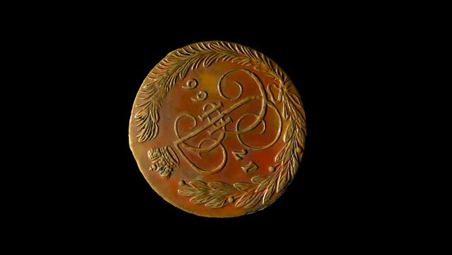 Reverse of Russian empire coin 5 copecks 1766, isolated in black background. 3d animation in 4k resolution video.