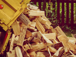 Truck is unloading firewood