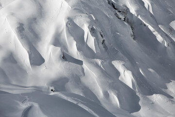 Snow covered mountains with fresh snow in Tyrol in Austria. Skiing in backcountry powder snow. 